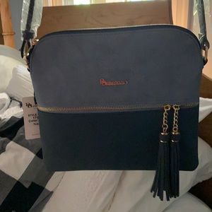 Beautiful New with tags Bretano purse!